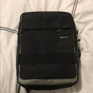 Tumi T Tech Back Pack converts to briefcase.